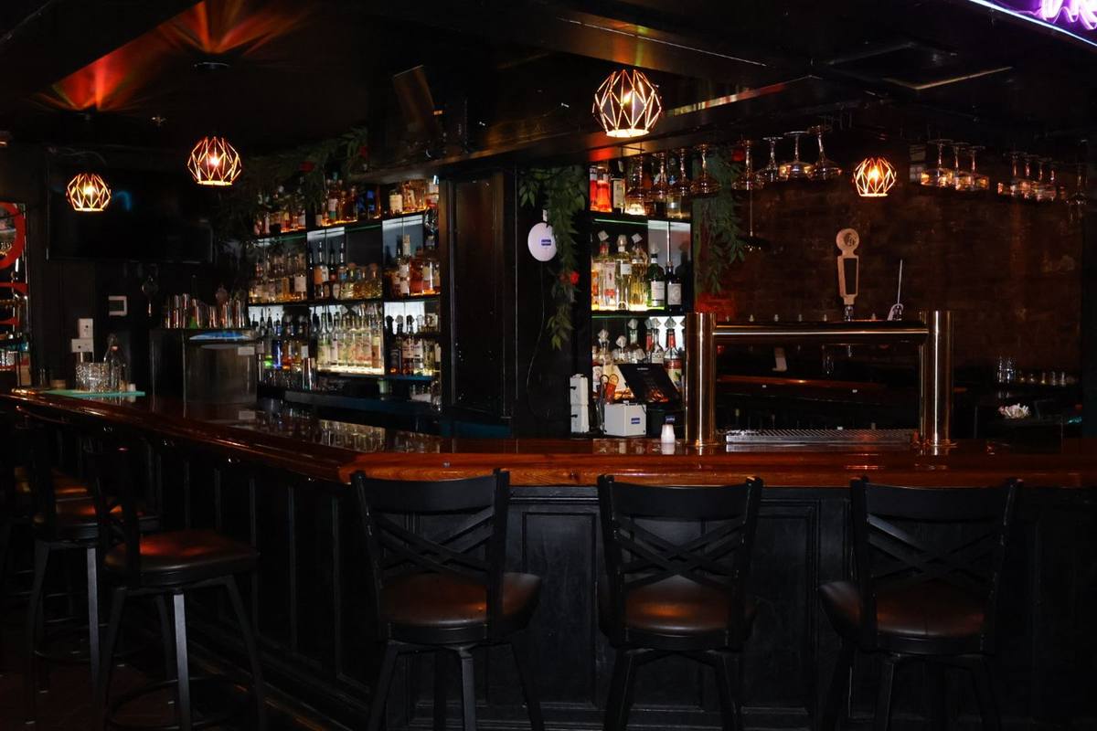The back bar at The Waiting Room, Hoboken — available for full venue buyouts up to 125 guests